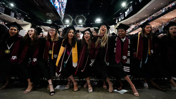 Students celebrating graduation